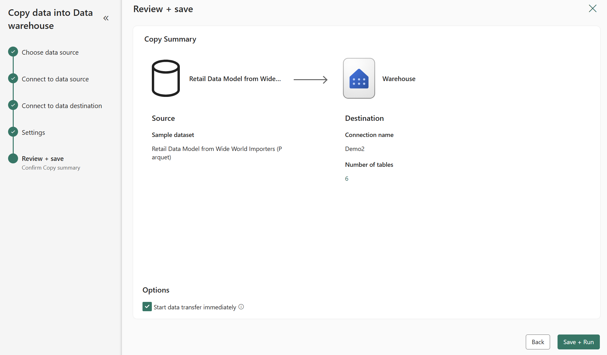 Skærmbillede fra Fabric-portalen af Copy Data Review + Save-skærmen.