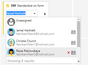 Screenshot of reassigning a work item from the Taskboard card.
