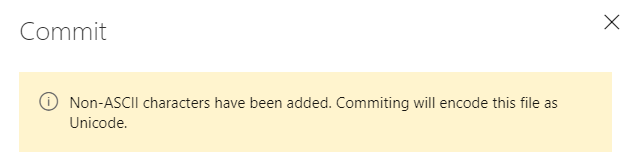 Capture d’écran montrant un message d’avertissement indiquant : Les caractères non ASCII ont été ajoutés. Le commit encodera ce fichier en tant qu’Unicode.