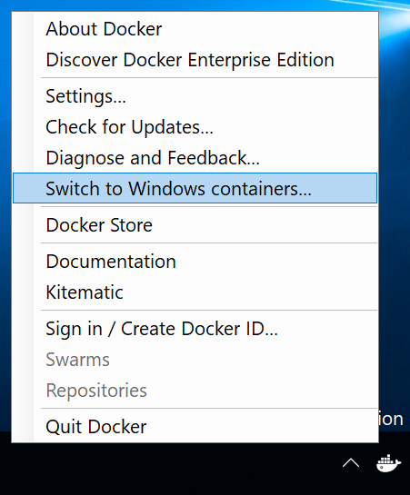 Captura de tela do menu de bandeja do sistema do Docker. O comando Mudar para contêineres do Windows está selecionado.