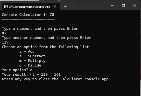 显示带有提示的“计算器”应用的控制台窗口的屏幕截图。